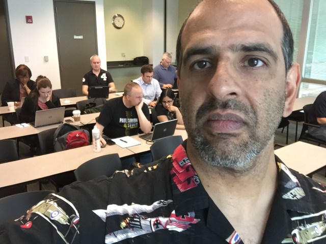 standing in front of the class